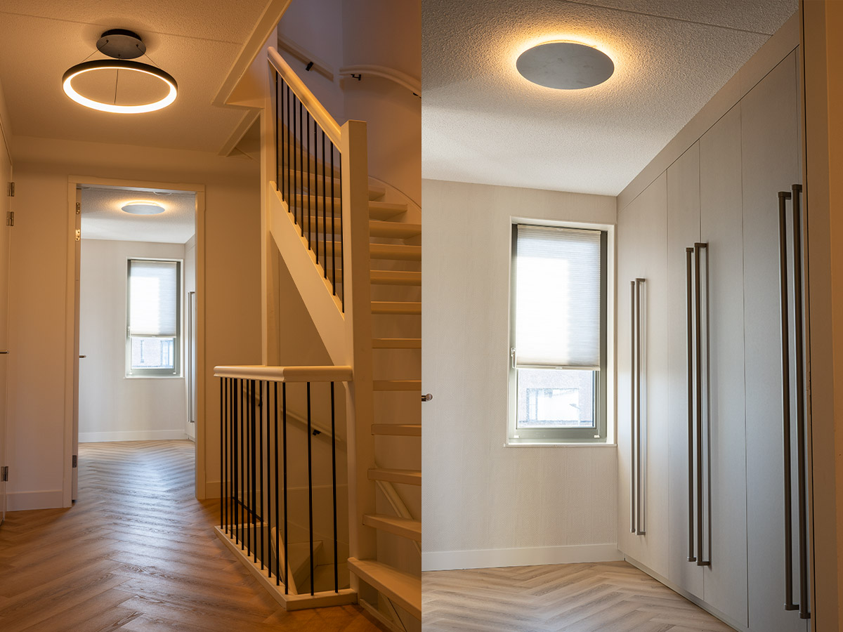Moderne plafondverlichting in hal en overloop met warm licht, toegepast door Straluma voor een rustige en functionele lichtoplossing.