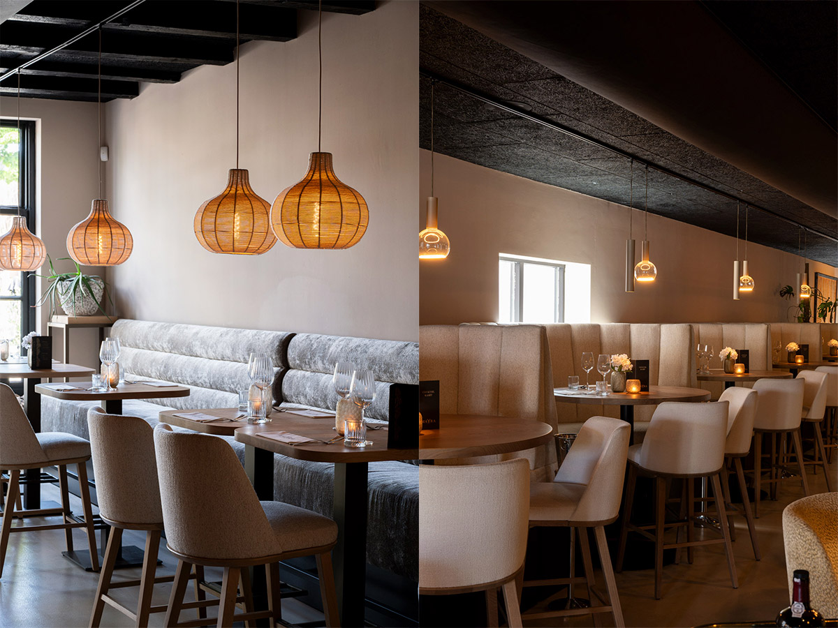 Straluma projectverlichting met rotan hanglampen en design verlichting in een sfeervol restaurantinterieur